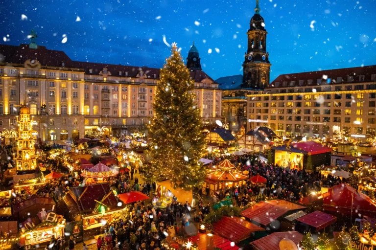 People visit Christmas Market Striezelmarkt in Dresden, Germany
